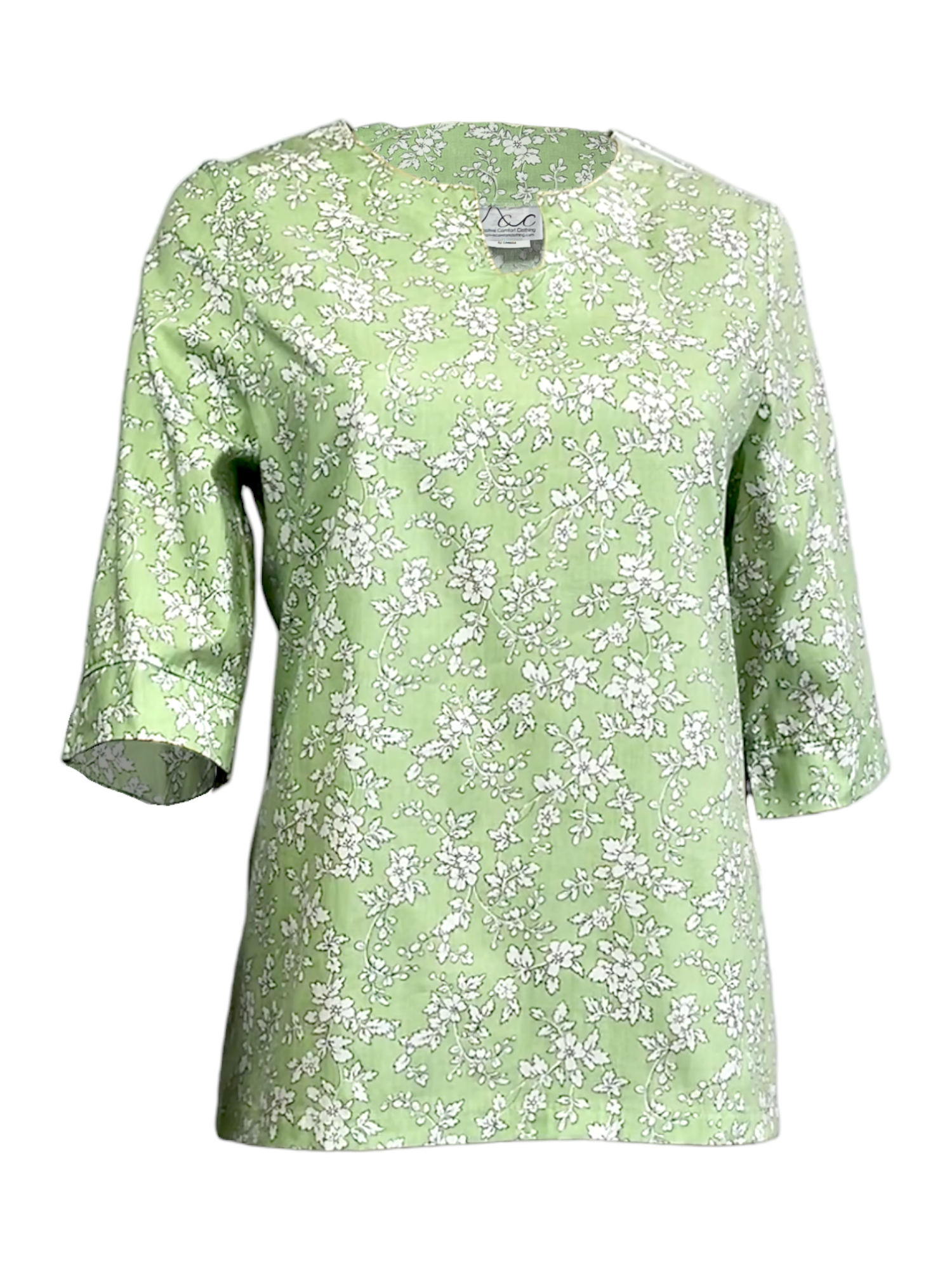 A floral print tunic blouse in mint green with 3/4 sleeves and a round neckline.