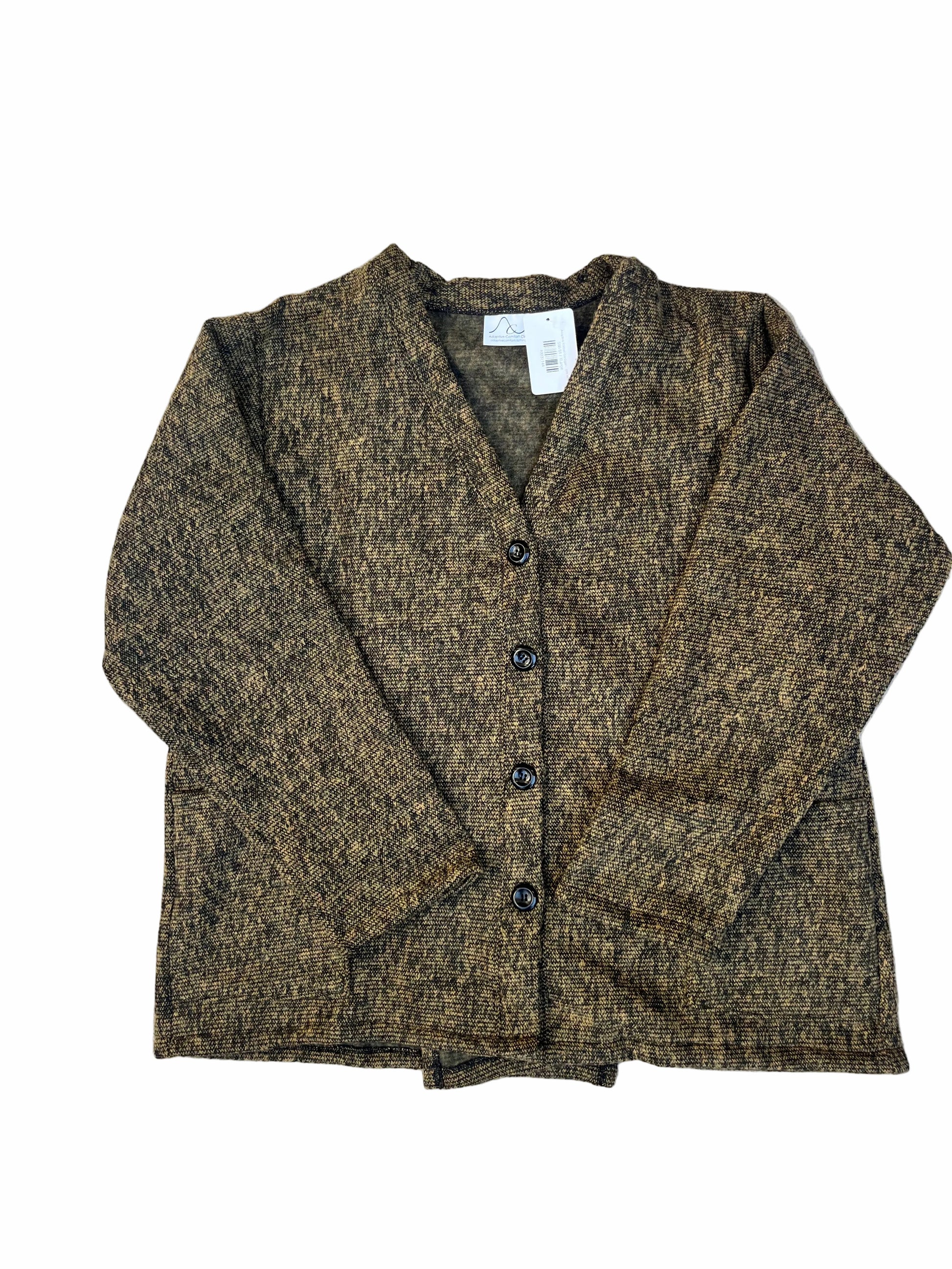 Folded brown jacket on a textured surface with a wooden floor visible.